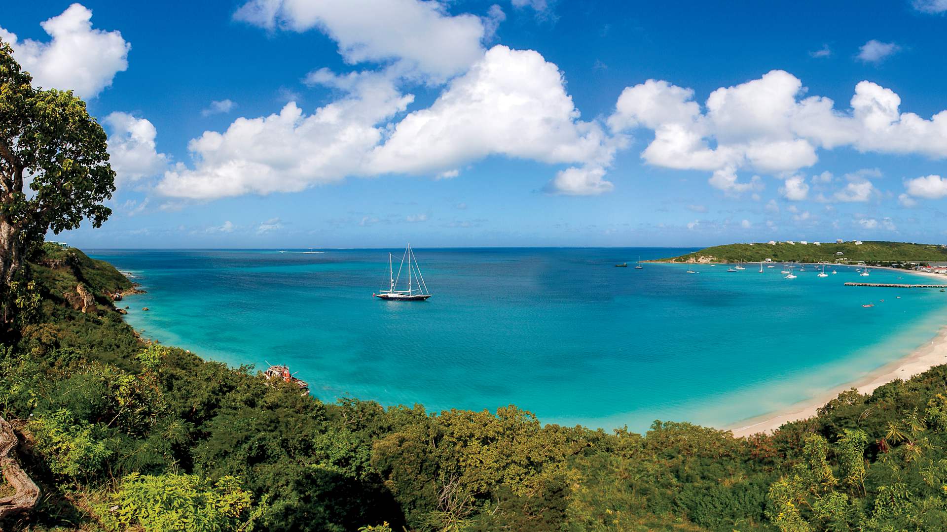 With its protected shoreline, calm surf, spectacular coral reefs, and sugar-soft beaches, Road Bay has become a destination for boaters, eager to visit its delightful restaurants, bars, and shops.