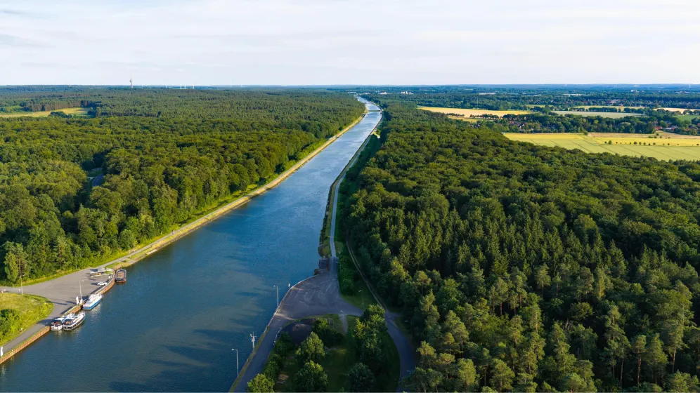 Transit the Kiel Canal from Copenhagen to Hamburg, with Germany's countryside gliding past at eye level.