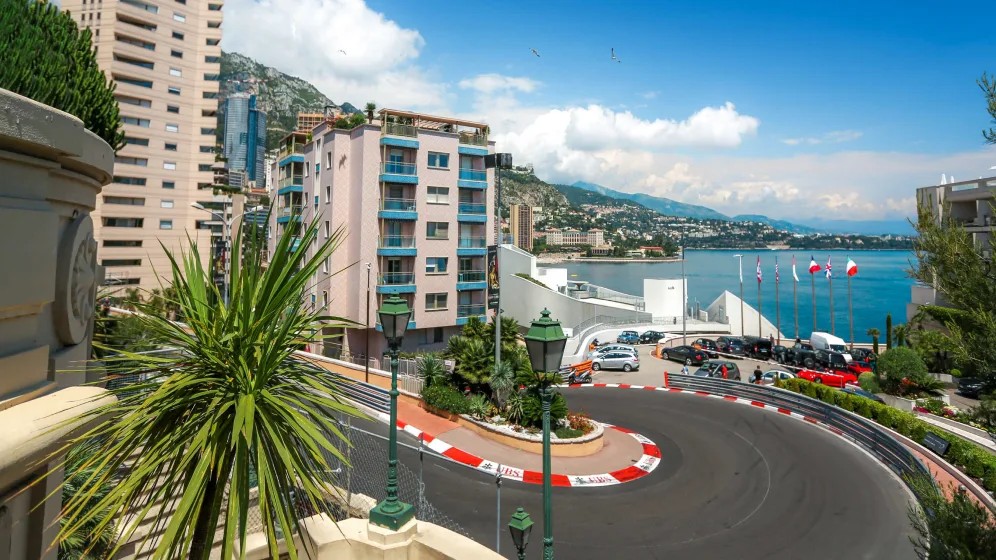Watch Grand Prix Europe roar along Monaco's seafront circuit from a yacht at anchor in the harbor.